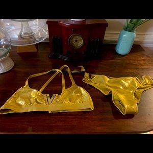 2pc. Gold Voyage swimsuit. Size medium